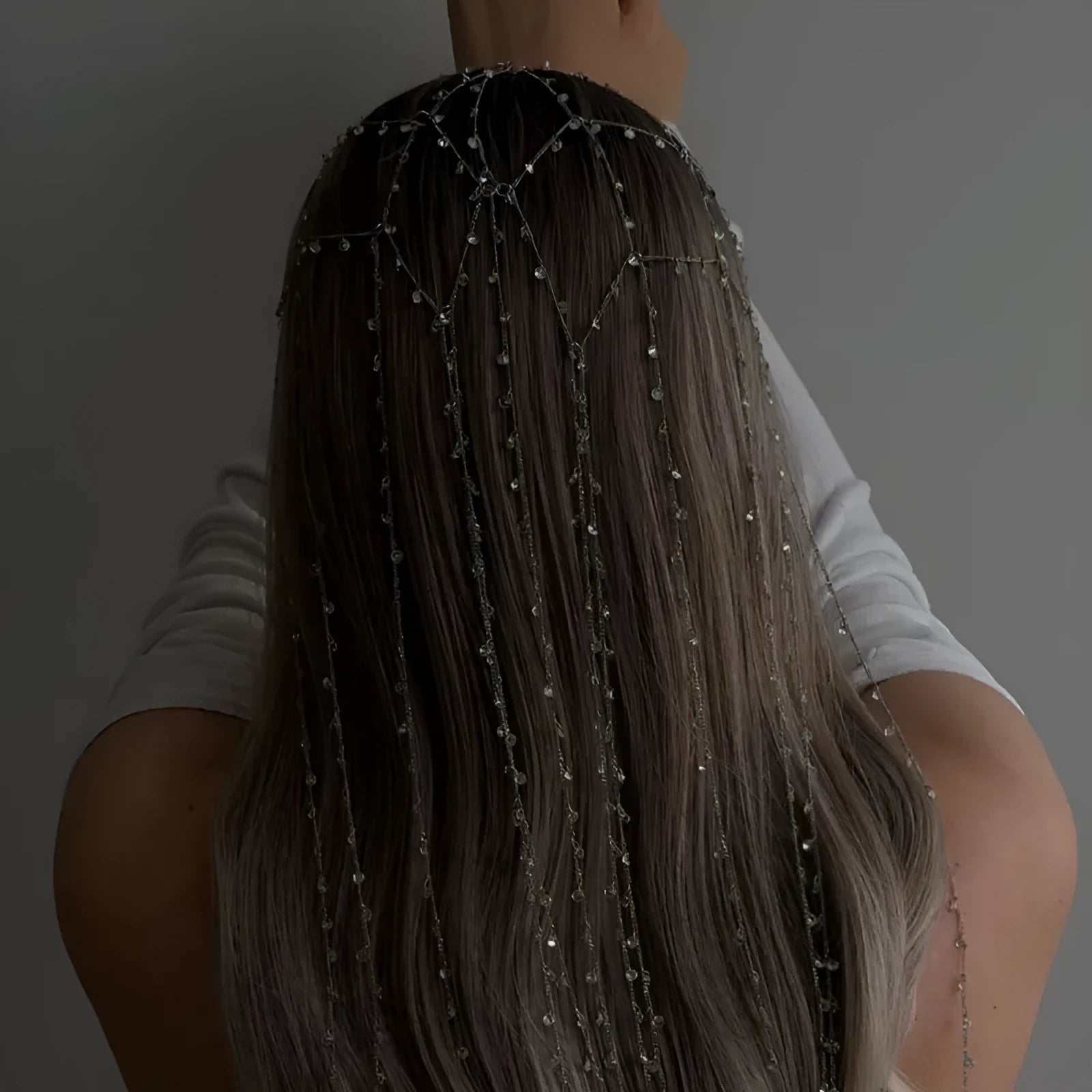 Gold and silver mesh hair bands with rhinestone bead trim and a tassel decorative element.