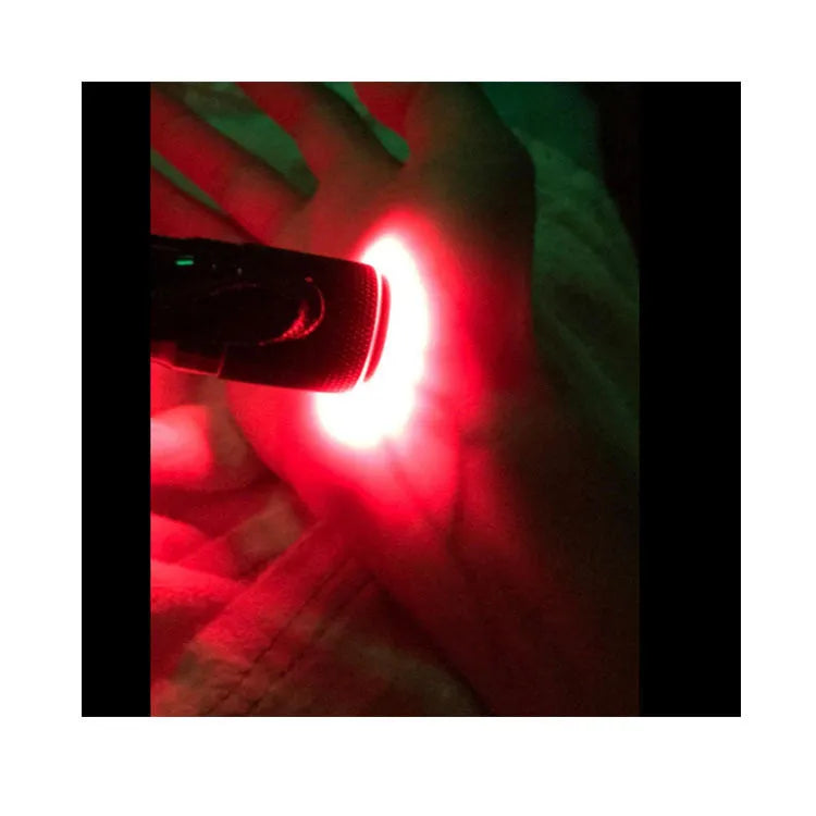Black aluminium Smart Vein Locator handheld red light device for medical and outdoor use.