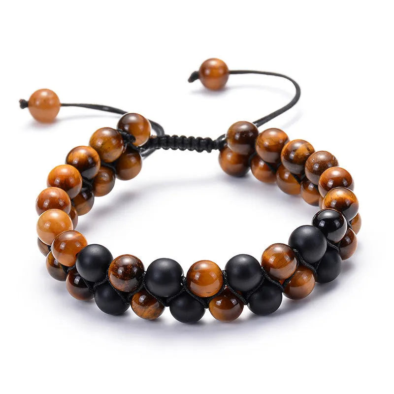 Geometric matte black agate couple bracelets with tiger eye beads, shown as a matching set.