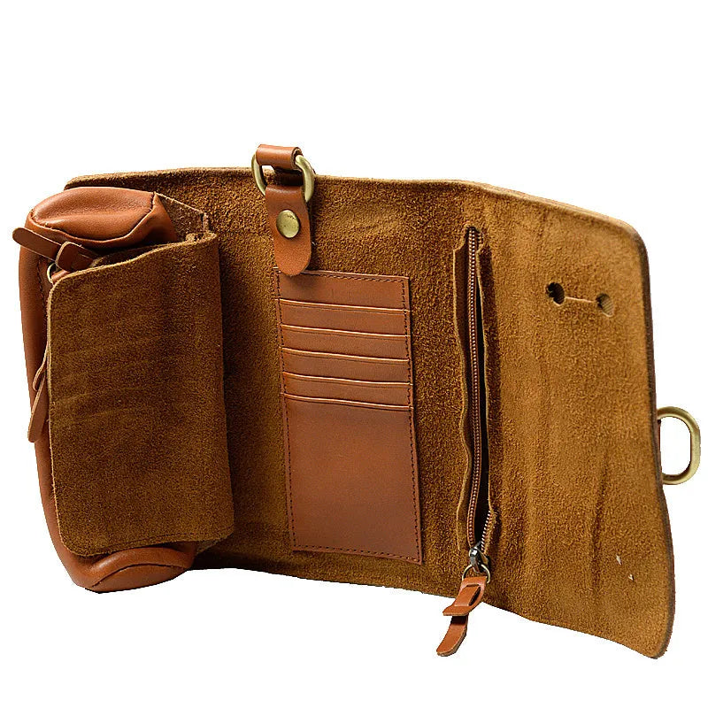 Handmade brown cow leather vintage wallet with tape closure, lying flat.