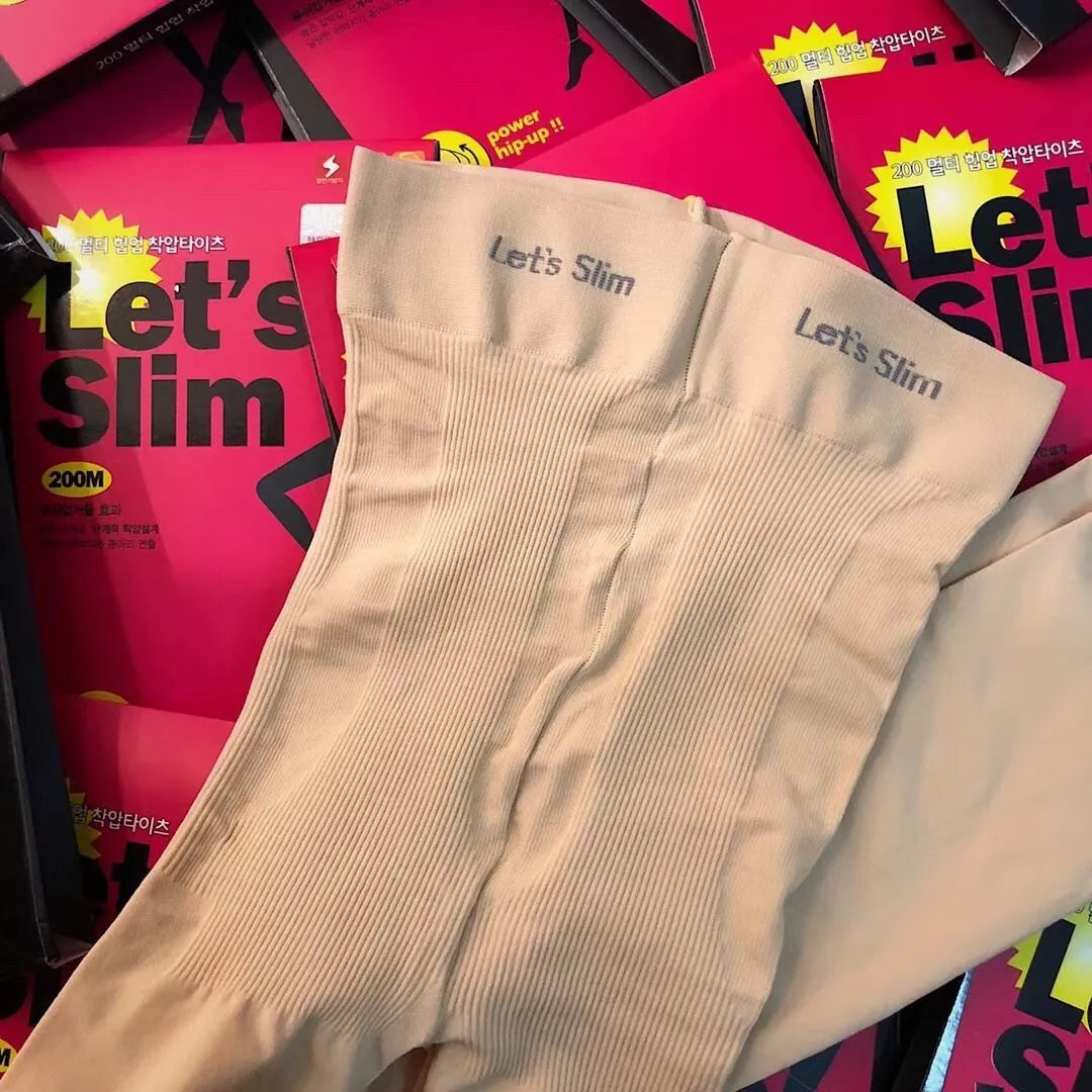 Beige and black hip and abdomen lifting stovepipe socks made from polyester fibre