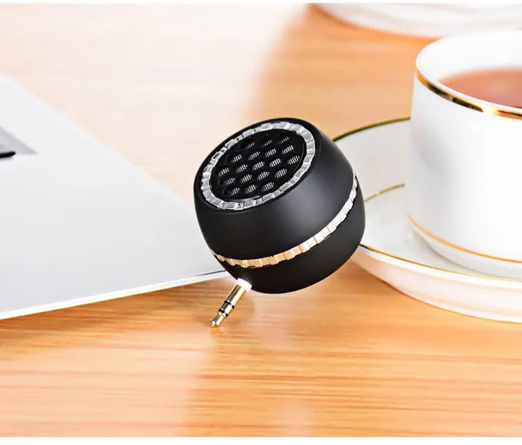 Universal external amplifier speaker in black, gold, and rose gold colours with 5V power input