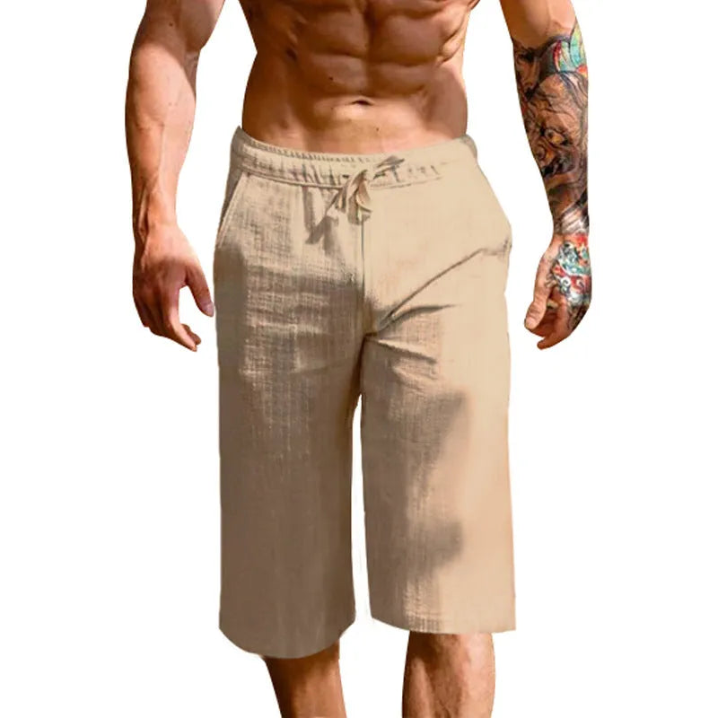 Men's loose linen blend cropped pants in khaki, shown on model, mid-waist straight leg