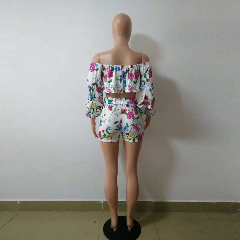 Women's digital print two-piece outfit with pile sleeves on short-sleeve top and matching shorts in multi-colour pattern