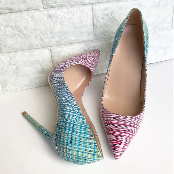 Women's pointed toe gradient colour patent leather stiletto heels on a rubber sole, shown in a shallow court shoe style.