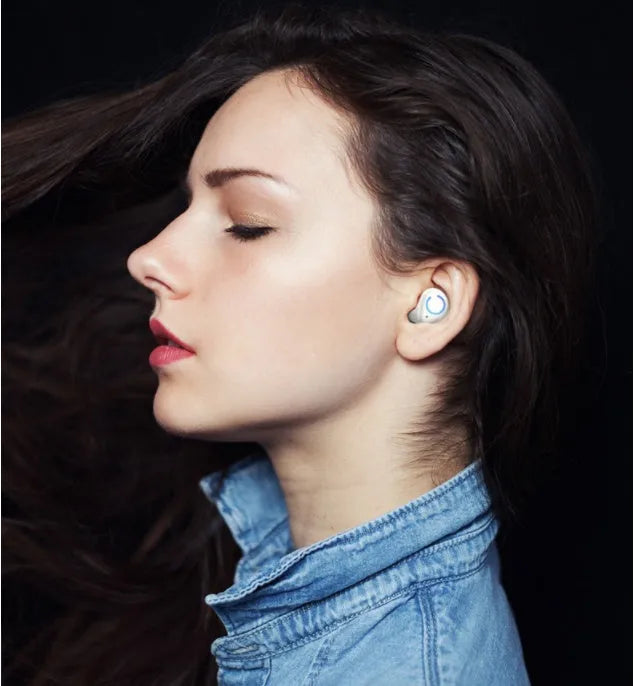 M18 true wireless in-ear stereo headset in black and white colours with charging case.