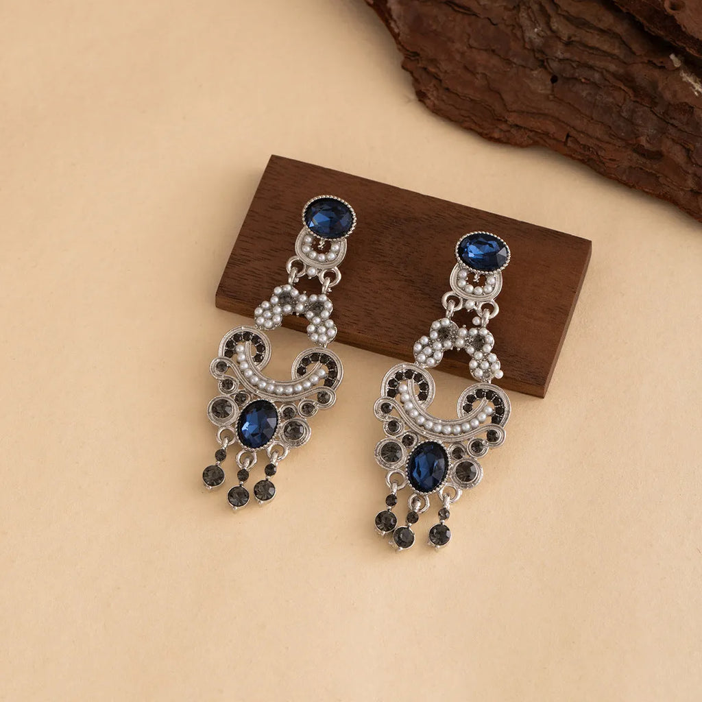 Vintage court style earrings with atmospheric blue crystal and chamfered square grain geometric shape in E7744 colour