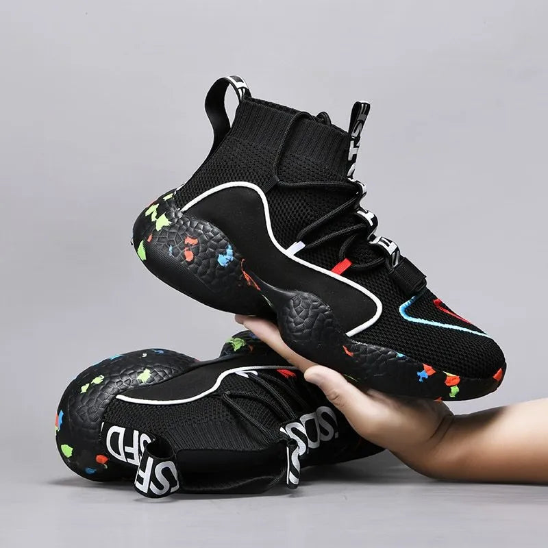 Men's camouflage black vulcanised sneakers with mesh upper and flat rubber sole on a white background.