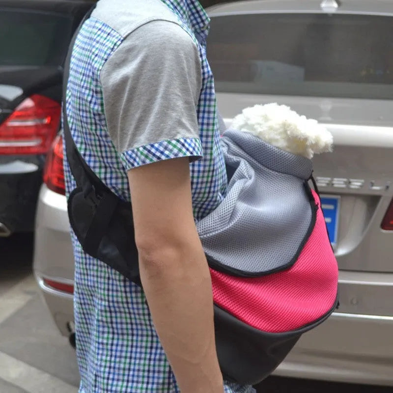 Polyester pet backpack carrier for cats and small dogs in blue colour with adjustable shoulder straps