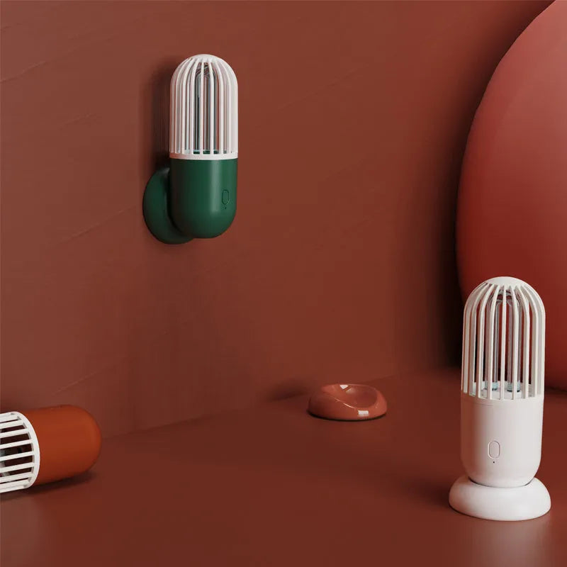 Portable capsule ultraviolet disinfection lamp in black, brown, green or white with dimensions 52x52x136mm