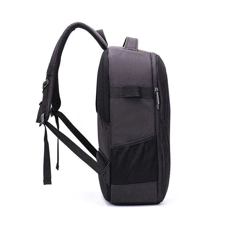 Black waterproof drone backpack with multiple compartments for camera and computer equipment
