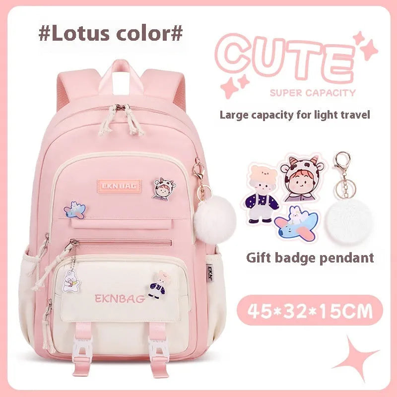 Pink waterproof Oxford cloth school backpack for girls with curved shoulder straps on a white background.