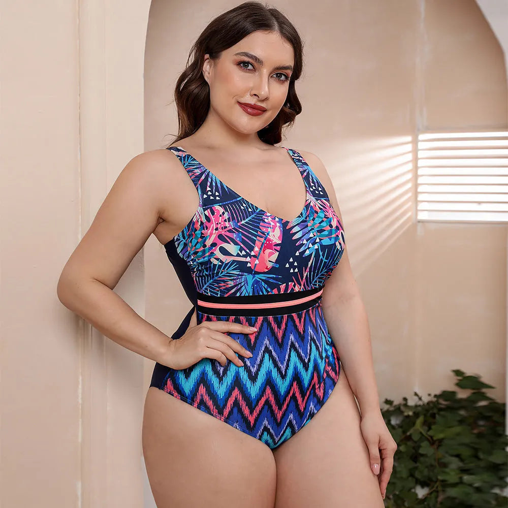 Women's printed spaghetti strap one-piece swimsuit in blue, white, and green patterns with vest style