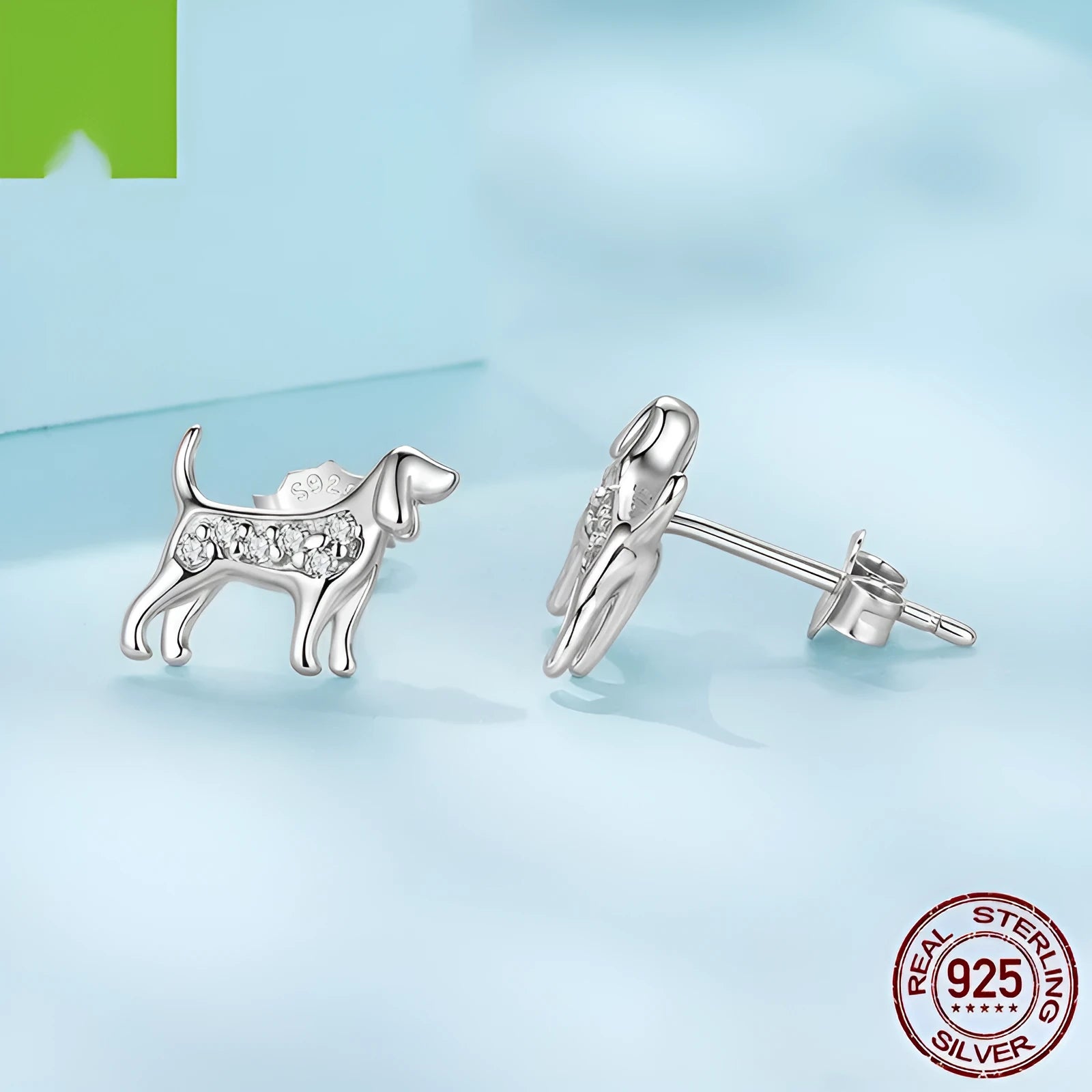 Golden retriever mini ear studs in silver with electroplated finish on a white background