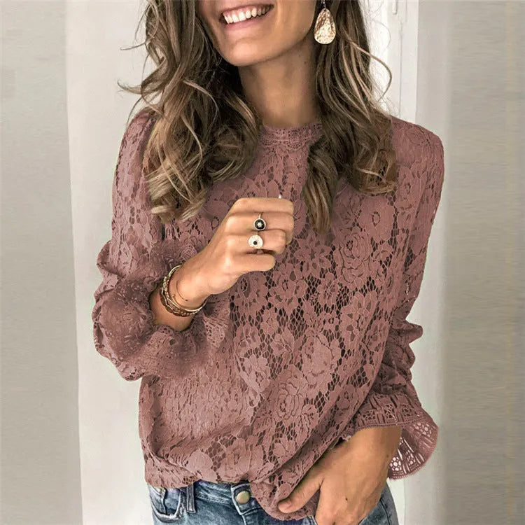 Women's loose-fit hollow lace shirt with long sleeves, round neck, and zipper detail in green.