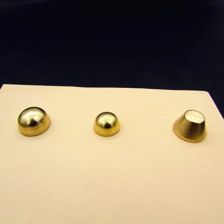 Brass decorative foot nail buckles in round and bucket shapes, sizes 10x6mm and 12x7mm.