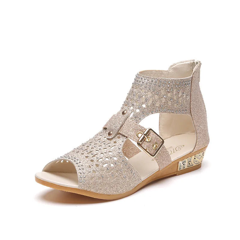 Women's beige patent leather flat sandals with a low wedge heel and back zipper closure