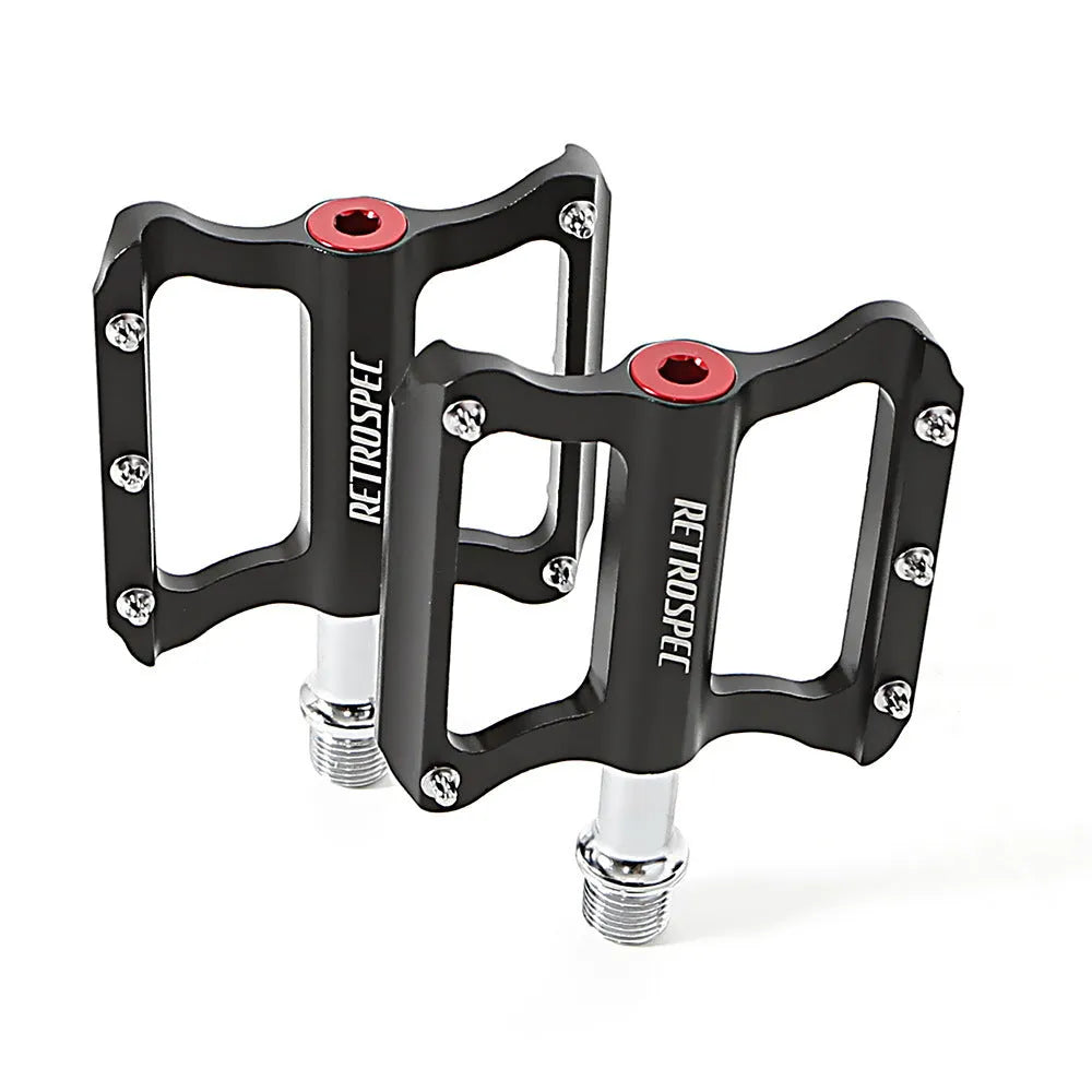 Pair of black aluminium CNC machined mountain bike pedals with anti-skid nails sealed bearing