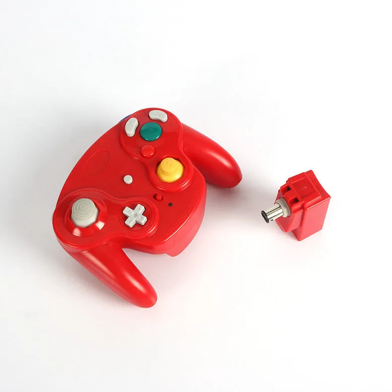 NGC wireless game controller for Wii and NGC consoles in six colour options showing dimensions.