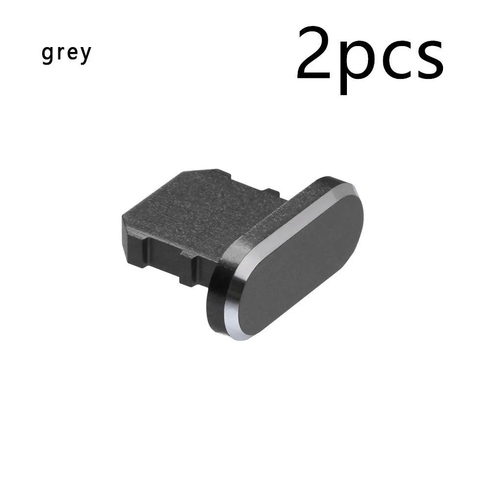 Aluminium alloy charging port dust plug for iPhone in various colours including gold, silver, and rose gold.