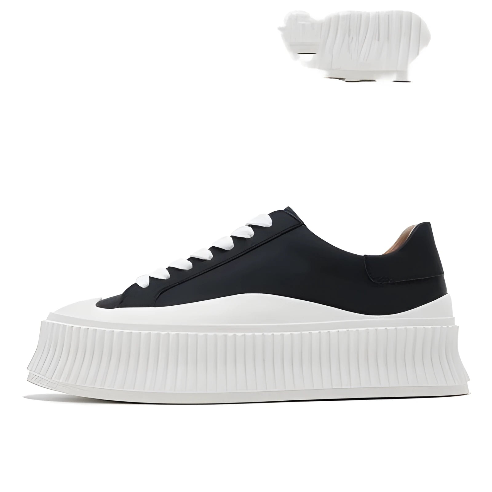 Women's black thick sole platform sneakers with back lacing system and suede leather construction