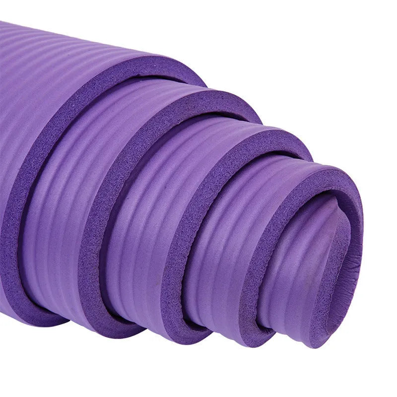 Five-piece beginner yoga set with purple mat, pink ball, tensioner, towel and brick