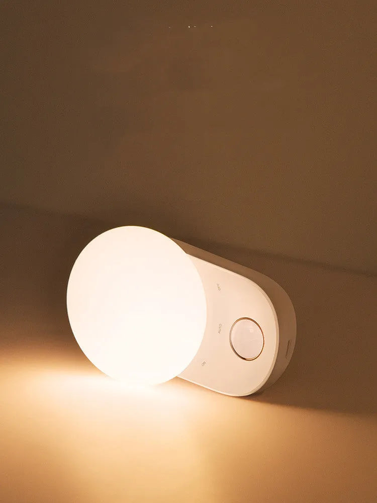 White rechargeable motion sensor LED night light with USB charging port