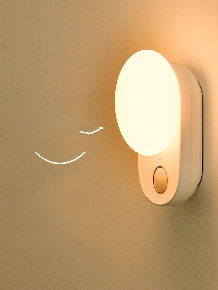 White rechargeable motion sensor LED night light with USB charging port