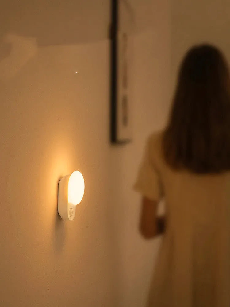 White rechargeable motion sensor LED night light with USB charging port