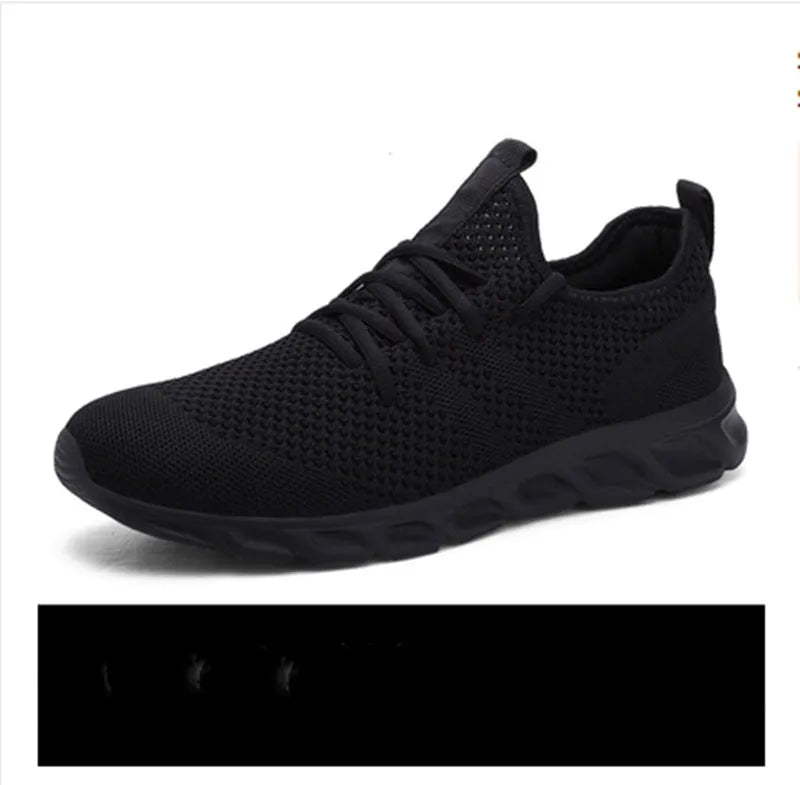 Men's black and white mesh sneakers with round toe and PVC sole for casual sport wear
