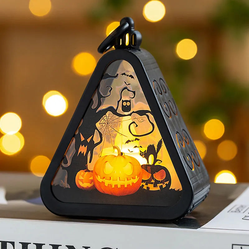 Halloween pumpkin lamp decoration in one of four designs: pumpkin, witch, castle or ghost hand