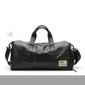 Large black waterproof PU leather sports training bag with multiple internal compartments.