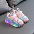 Children's breathable mesh Velcro sneakers in black, grey and pink colours showing rubber sole and adjustable fastening