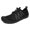 Low-profile mesh water shoes with rubber sole in black, grey, blue, or purple for river tracing and wading.