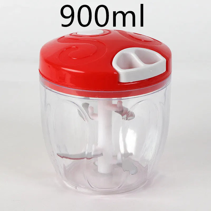 Green manual food chopper with lid open, showing three stainless steel blades inside a 500ml plastic container.
