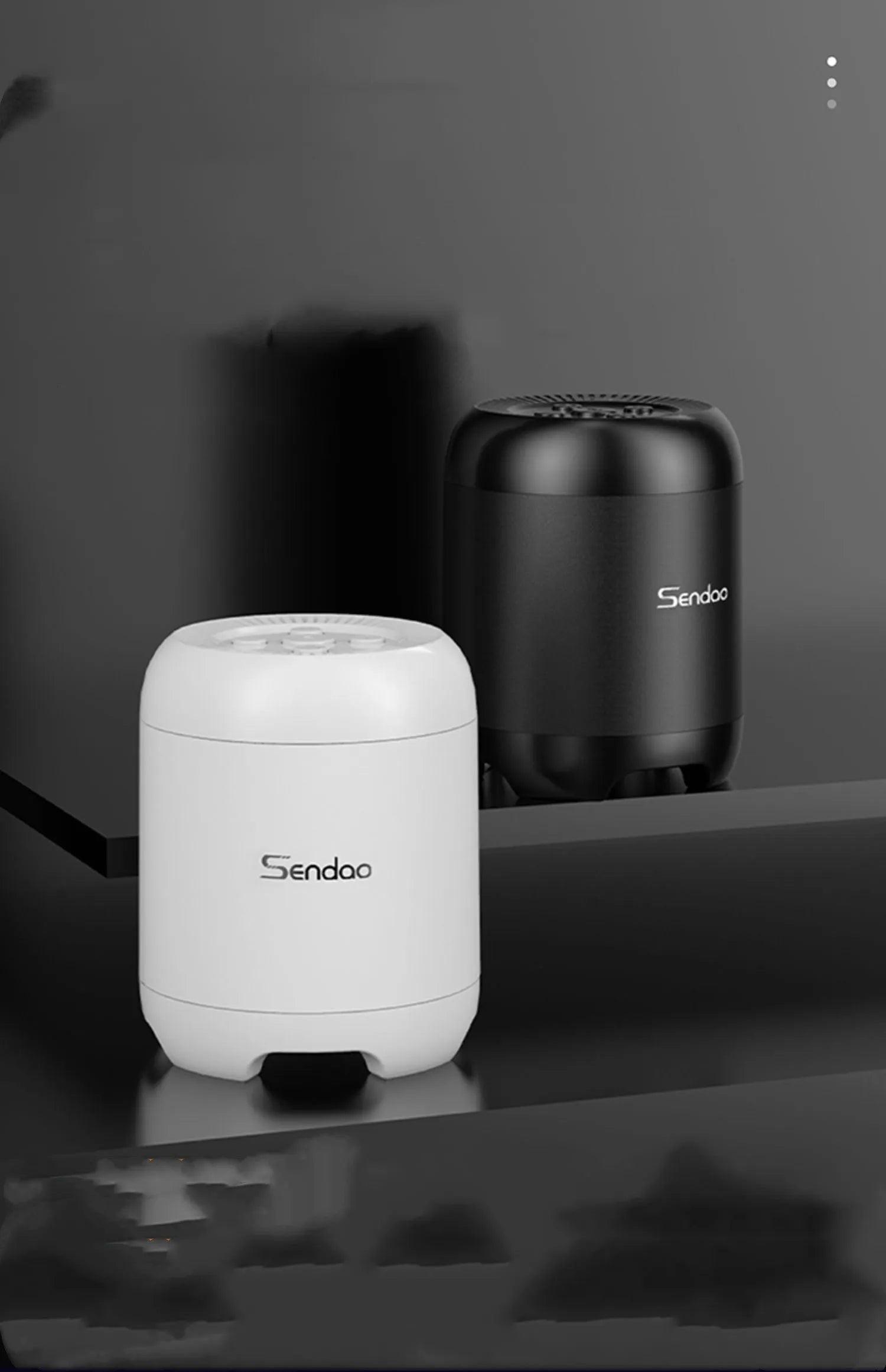 Small black wireless Bluetooth speaker with card reader slot and USB port