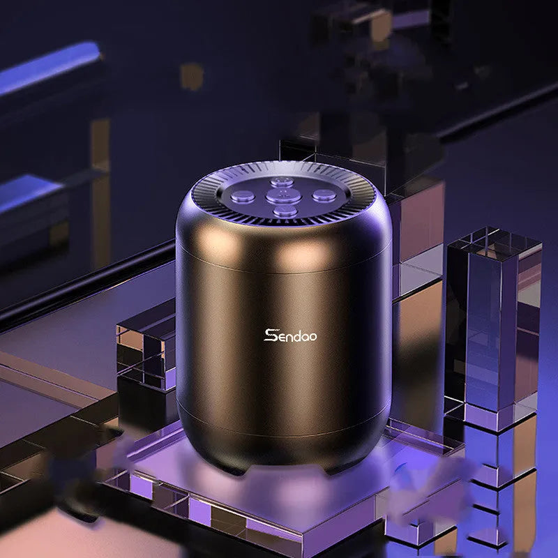 Small black wireless Bluetooth speaker with card reader slot and USB port