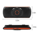 Orange Bluetooth car hands-free speaker with sun visor mount for wireless smartphone audio