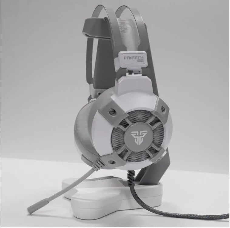 Black FANTECH HG11 USB gaming headset with RGB lights, large ear cups, and an adjustable microphone.