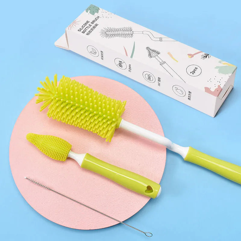 Silicone baby bottle brush and straw cleaner set in pink, blue, or yellow colours