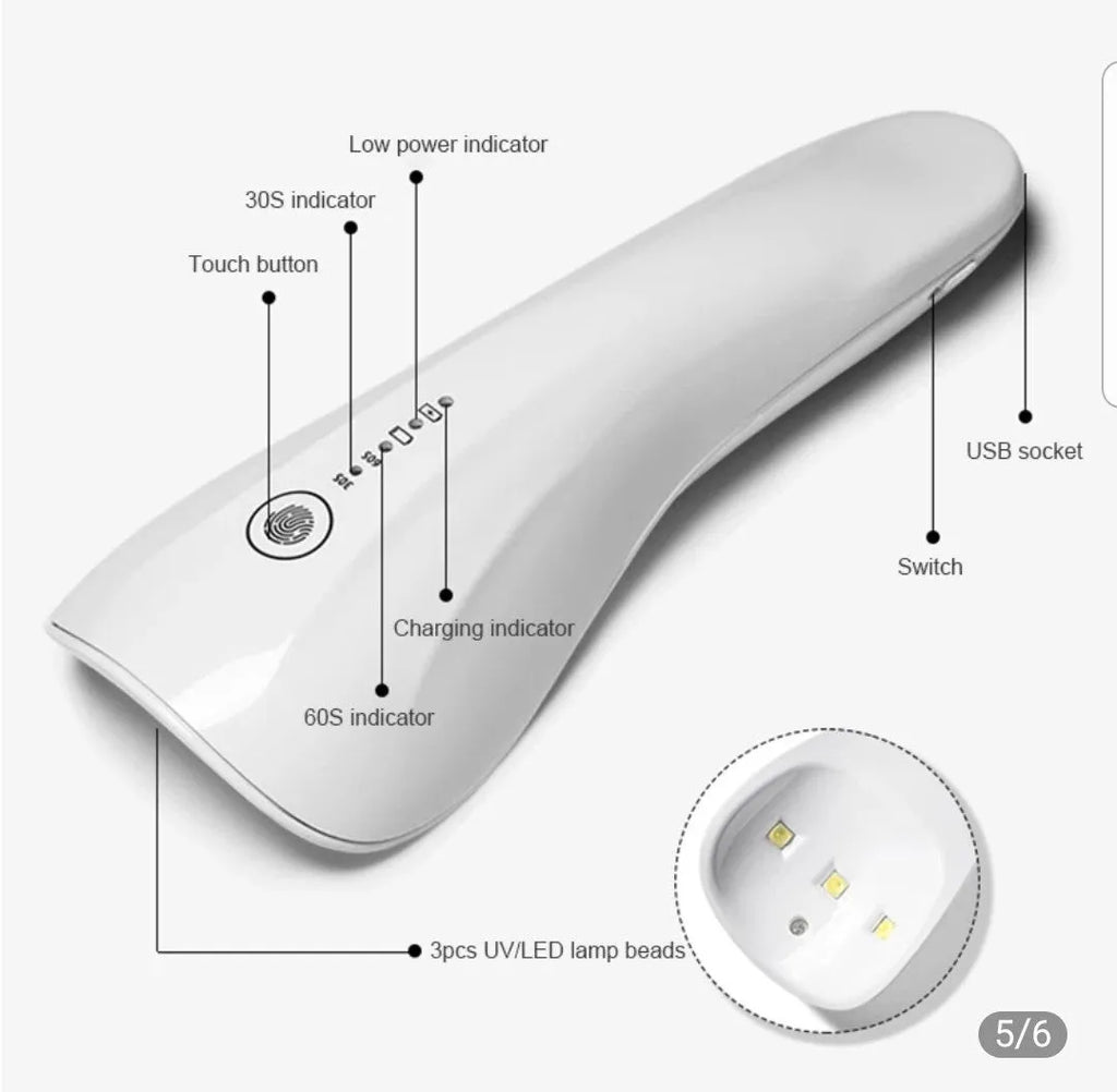 White portable 5W UV LED nail lamp with 3 beads and Micro USB charging on a table