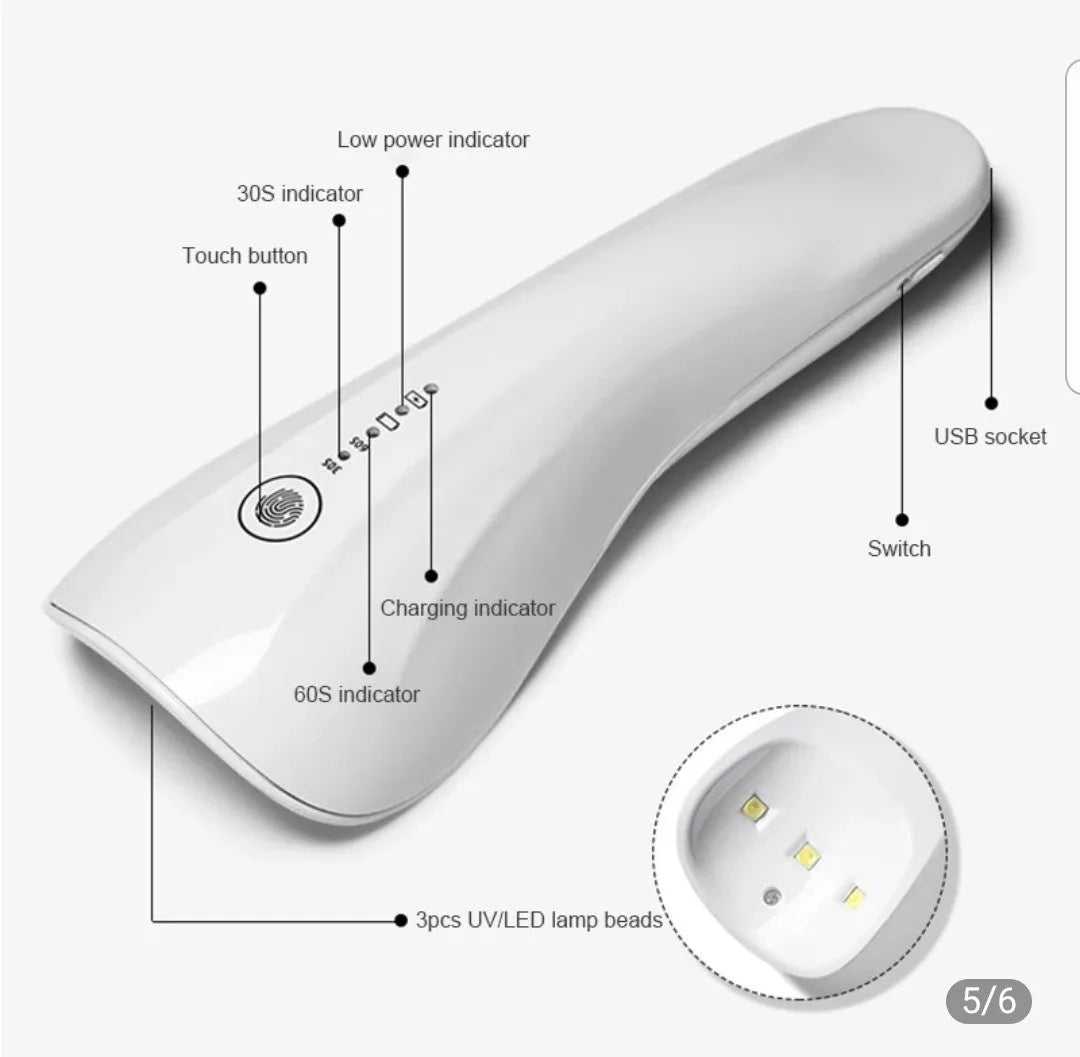 White portable 5W UV LED nail lamp with 3 beads and Micro USB charging on a table