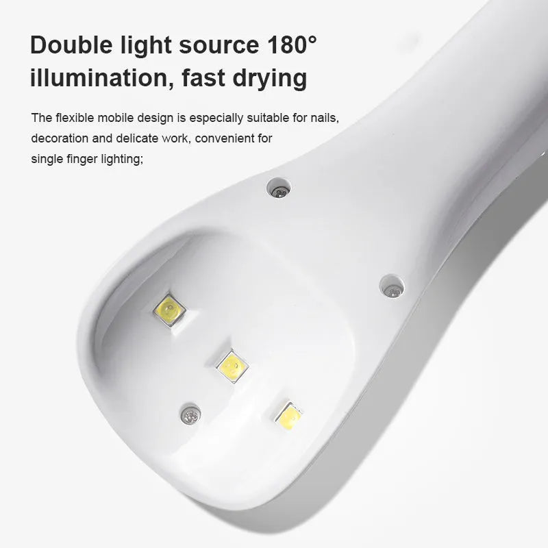 White portable 5W UV LED nail lamp with 3 beads and Micro USB charging on a table