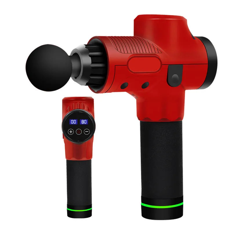 Black electric muscle massage gun with seven different coloured silicone heads on a table.