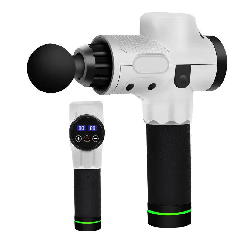 Black electric muscle massage gun with seven different coloured silicone heads on a table.