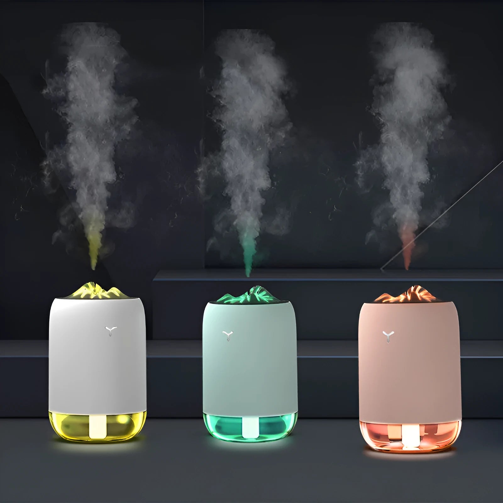 Magic Flame Humidifier columnar aroma diffuser with LED light effect in white, blue, or pink colours