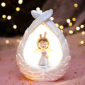 Angel wings star light made of synthetic resin with star and wing design, available in prayer or love style options