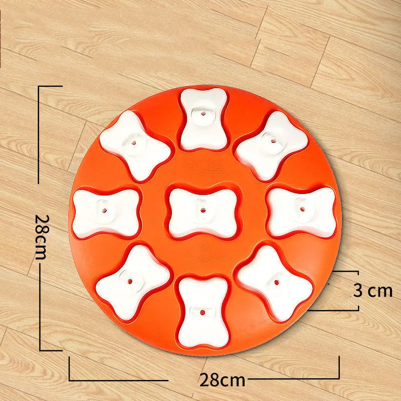 Blue interactive dog puzzle toy with nine compartments and bone covers on a light background