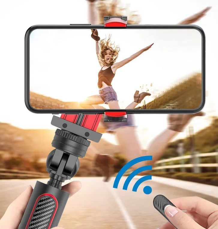 Black aluminium telescopic tripod extended to full height with an iPhone securely clamped for video recording.