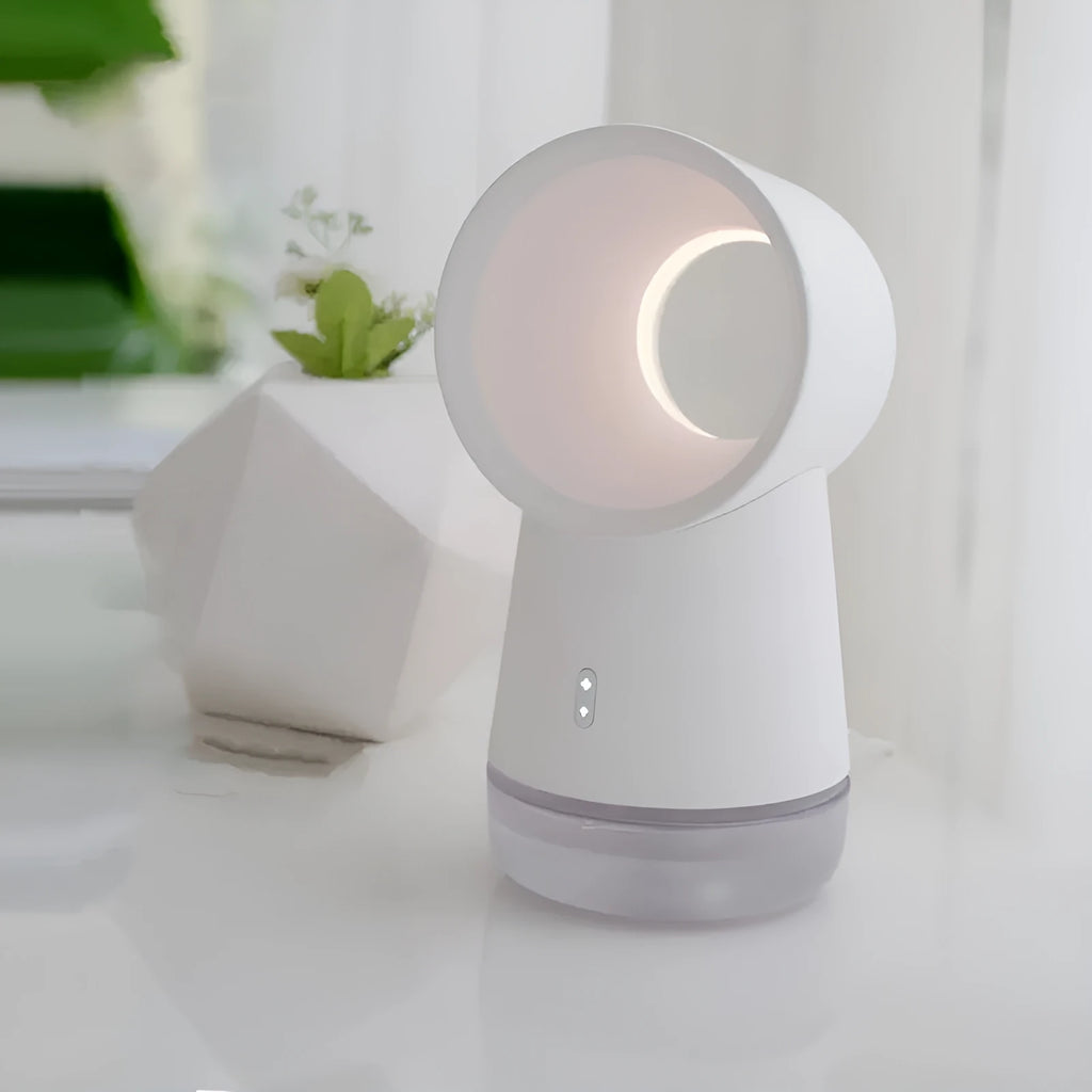 White desktop humidifier with leafless fan and night light on a wooden desk